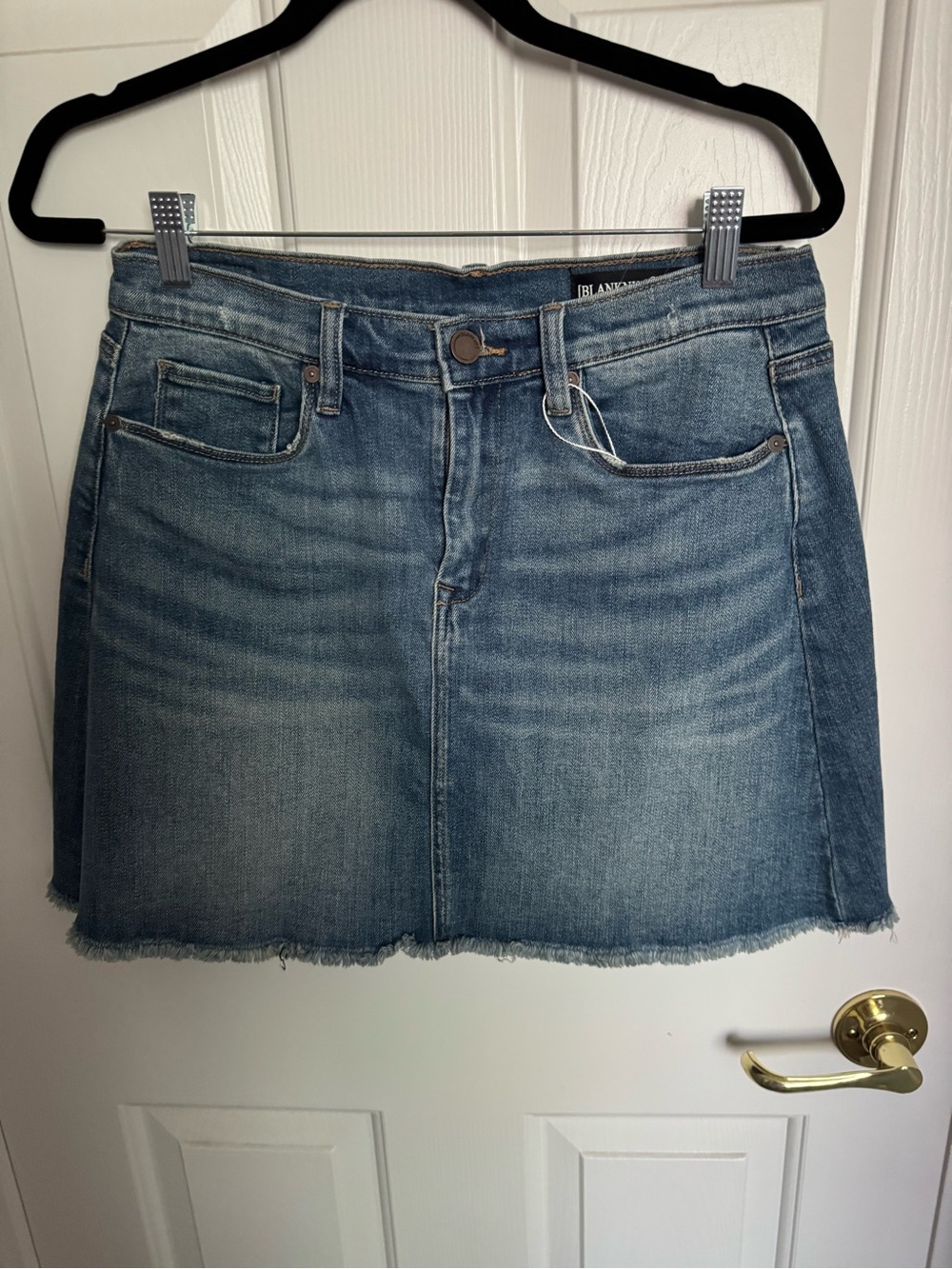 Blank NYC Medium Wash Denim Mini Skirt with Frayed Hem